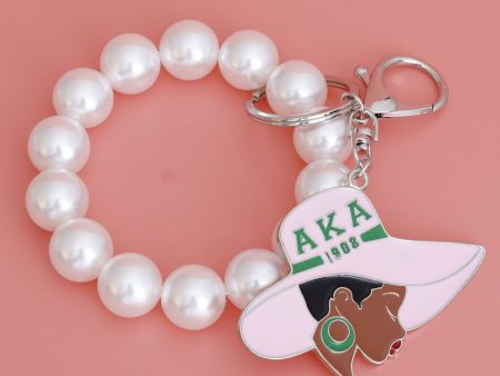 AKA Pink Green Hat Pearl Keychain Online